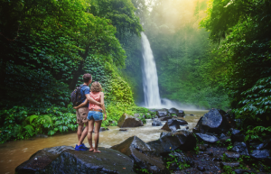 Couple looking at a waterfall in Malaysia