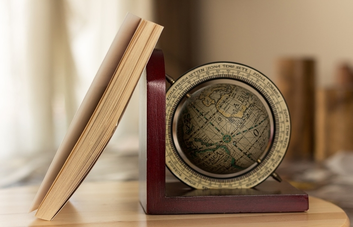 Travel book with a globe